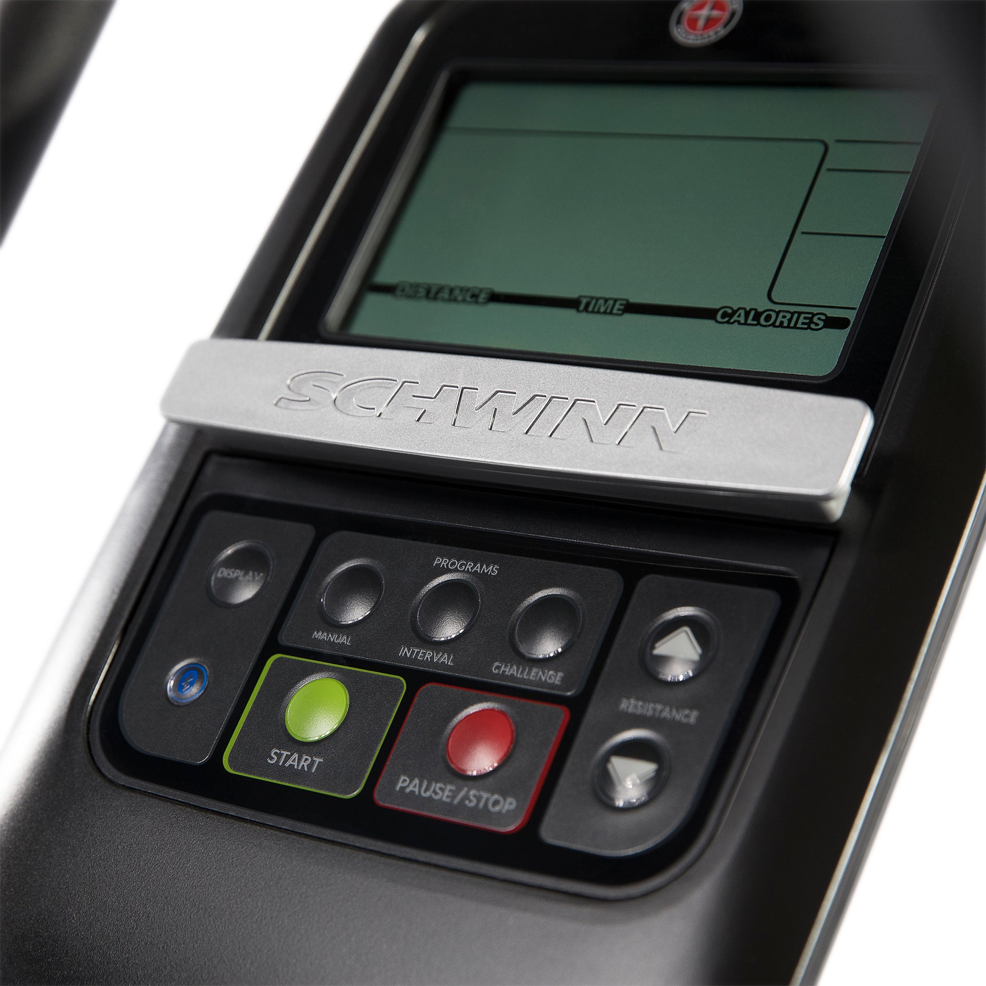 Close-up of a Schwinn elliptical console with control buttons and display.