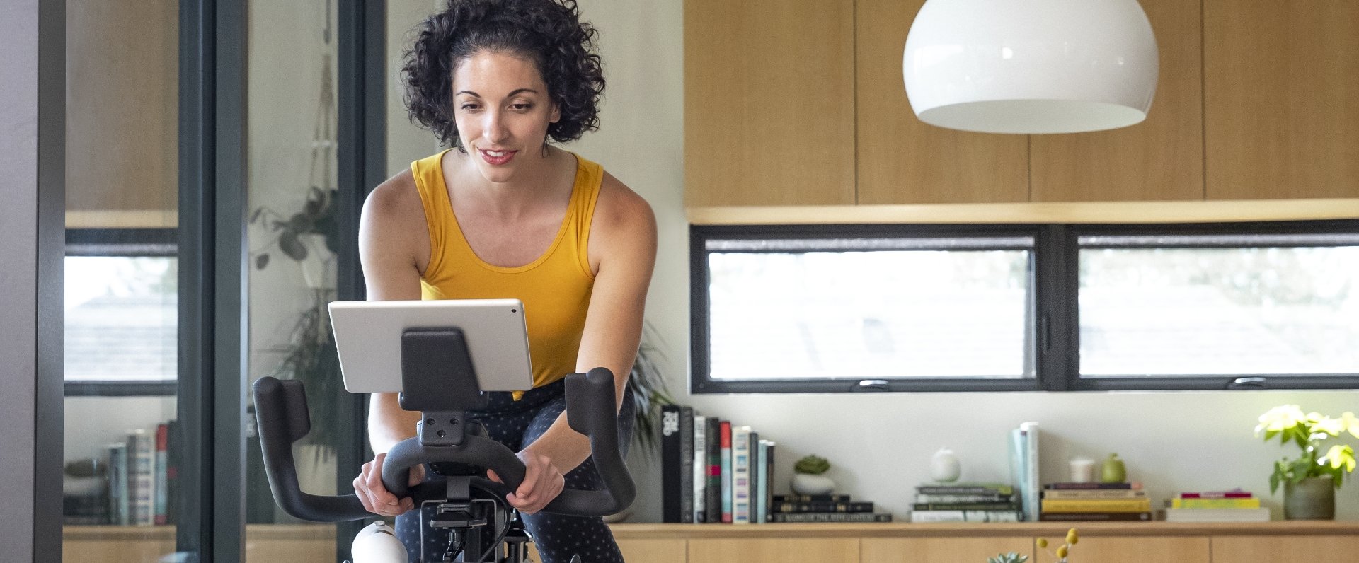 Athletic woman exercising on the IC4 Bike.